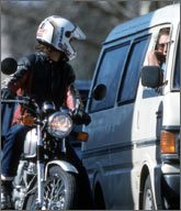 Rider talking to van driver